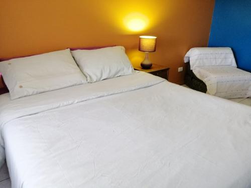 Cama o camas de una habitación en Hostal Maison de la Mer