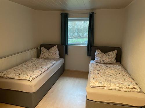 Katil atau katil-katil dalam bilik di Ferienhaus Gerswalde