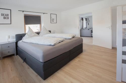 Katil atau katil-katil dalam bilik di Ferienwohnung zum Traumblick
