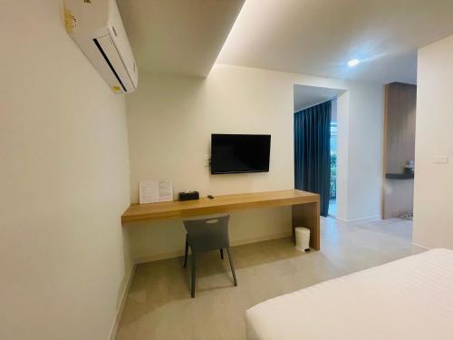 Télévision ou salle de divertissement dans l'établissement ARENICE Boutique Hotel
