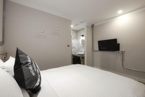 Posteľ alebo postele v izbe v ubytovaní Napas Hotel