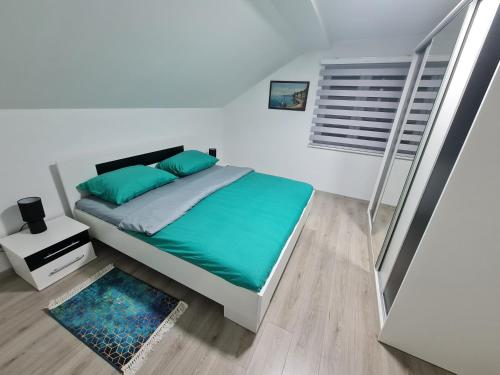 Llit o llits en una habitació de Apartment Djurdjic