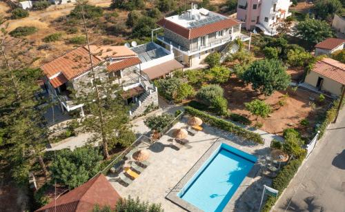 an aerial view of a house with a swimming pool at Villa Medusa in Hersonissos