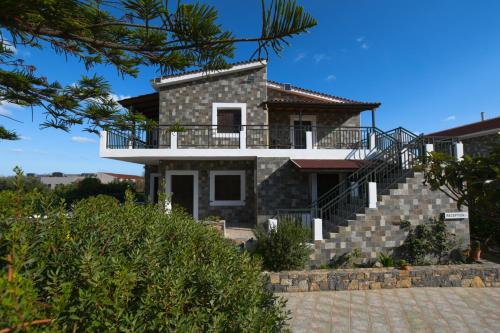 a house on the hill with a balcony at Villa Medusa in Hersonissos