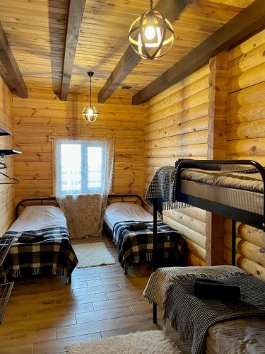 Postel nebo postele na pokoji v ubytování Тіні Предків