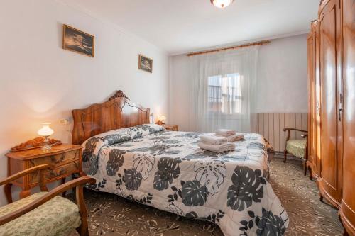 En eller flere senge i et værelse på Casa Anita