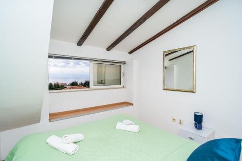 Postel nebo postele na pokoji v ubytování Deluxe Duplex House With Terrace