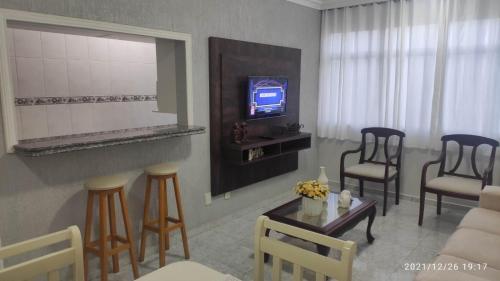 TV a/nebo společenská místnost v ubytování Apartamento Beira mar