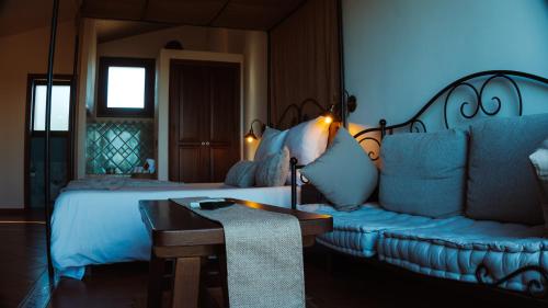 Postel nebo postele na pokoji v ubytování El Nido de Ballesteros