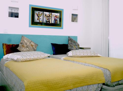Ένα ή περισσότερα κρεβάτια σε δωμάτιο στο Consuls Ocean View