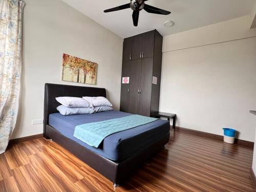 Postel nebo postele na pokoji v ubytování Ayer8 Putrajaya Guesthouse