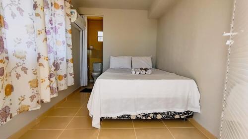 Katil atau katil-katil dalam bilik di Pousada Vila do Mar Prea