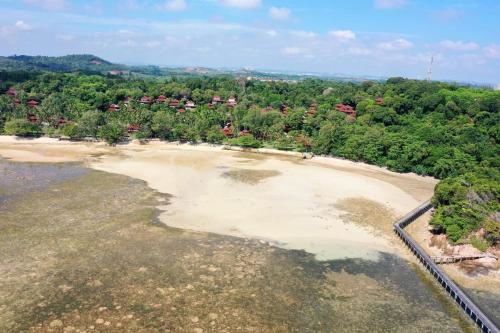 an aerial view of a beach with trees at Nongsa Village Peaceful Villa in private beach Resort in Nongsa