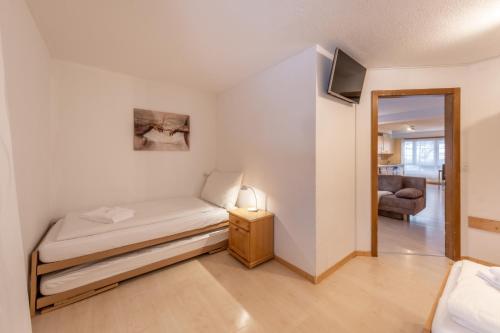 Ein Bett oder Betten in einem Zimmer der Unterkunft Quadernpark-Apartments