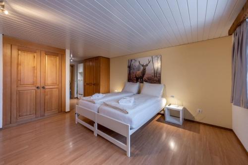 Ein Bett oder Betten in einem Zimmer der Unterkunft Quadernpark-Apartments