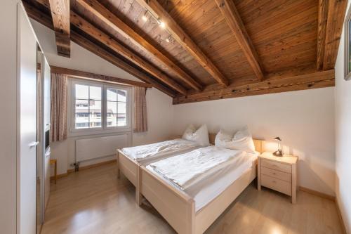 Ein Bett oder Betten in einem Zimmer der Unterkunft Quadernpark-Apartments