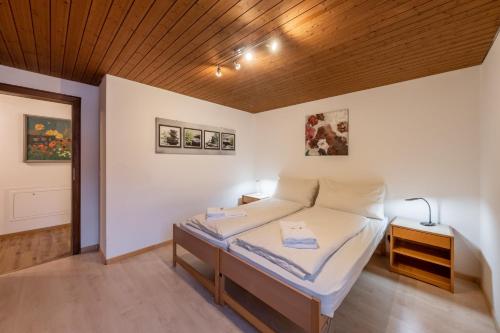 Ein Bett oder Betten in einem Zimmer der Unterkunft Quadernpark-Apartments