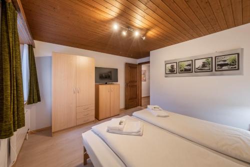 Ein Bett oder Betten in einem Zimmer der Unterkunft Quadernpark-Apartments