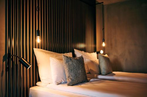 Ένα ή περισσότερα κρεβάτια σε δωμάτιο στο Hotel Maestoso - Lipica