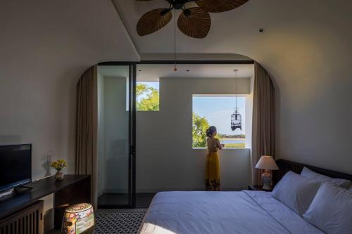Ένα ή περισσότερα κρεβάτια σε δωμάτιο στο Hoianoi Villa