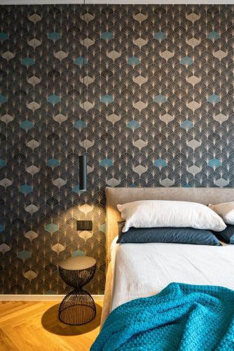 Un ou plusieurs lits dans un hébergement de l'établissement PANORAMA APARTMENT