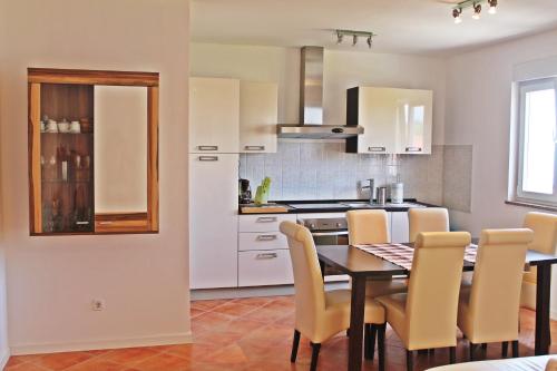 Kuchyňa alebo kuchynka v ubytovaní Apartments Jadran
