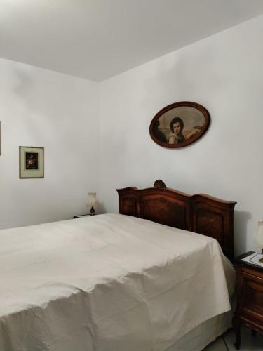 Posteľ alebo postele v izbe v ubytovaní Casa Costanza