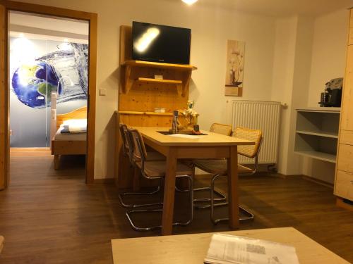 TV a/nebo společenská místnost v ubytování Appart Sölkhof