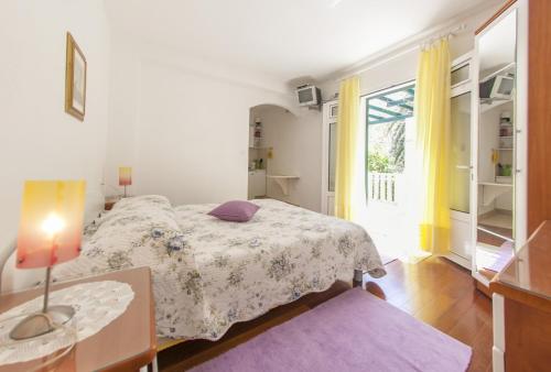Posteľ alebo postele v izbe v ubytovaní Studio apartment in Bol with sea view, terrace, air conditioning, WiFi 3634-1