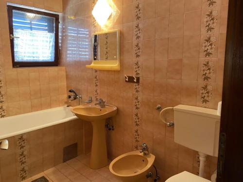 Kúpeľňa v ubytovaní Apartmani Infinity