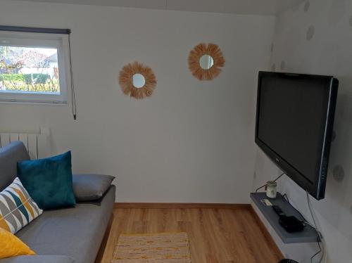 TV a/nebo společenská místnost v ubytování L alouette