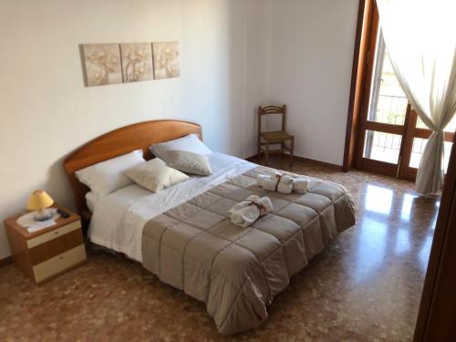 Ліжко або ліжка в номері CasAnna nel cuore del Salento Arnesano LE