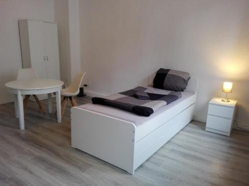 Postel nebo postele na pokoji v ubytování Monteurwohnung bei Nina