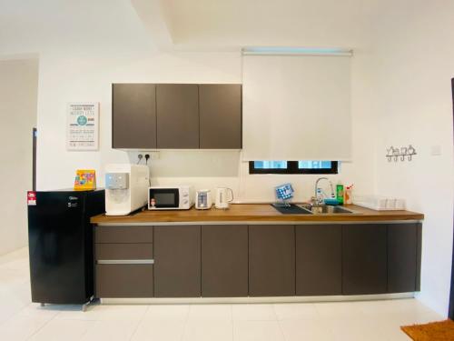 Η κουζίνα ή μικρή κουζίνα στο The Sweet Escape @ Imperio Professional Suite