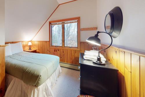 Cama ou camas em um quarto em Sunday River Village Timberline