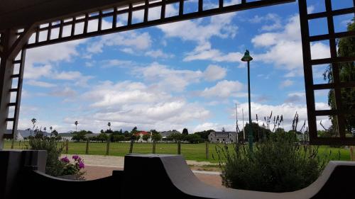 a view of a skate park through a window at Buchu & Num-num in Stanford