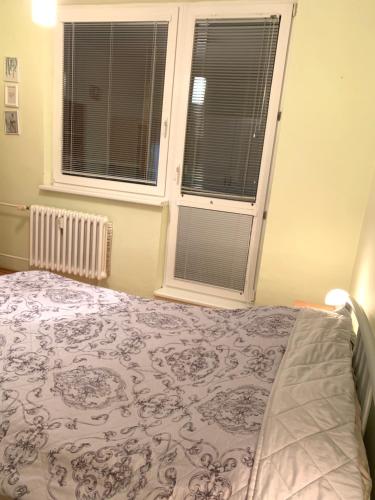 Ένα ή περισσότερα κρεβάτια σε δωμάτιο στο Apartment C47