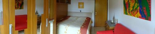 Una cama o camas en una habitación de Apartement GYARMATY