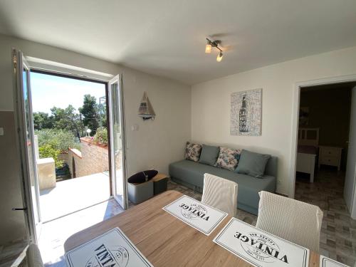 Χώρος καθιστικού στο Villa Beach House Sumartin with Heated Pool