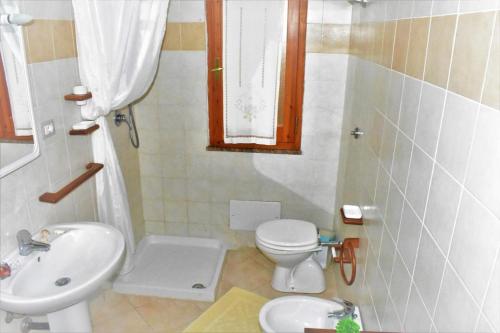 Ванна кімната в Villa Leonardo