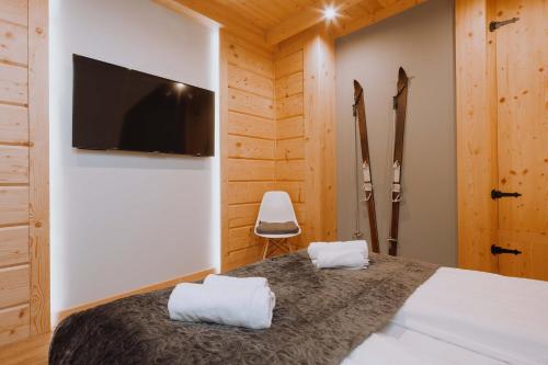 Posteľ alebo postele v izbe v ubytovaní Apartament Tatry Folk regionalny Grota Solna