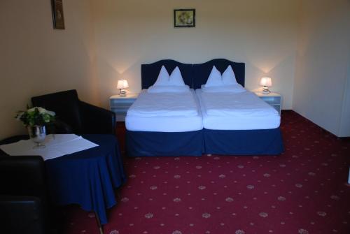 Ένα ή περισσότερα κρεβάτια σε δωμάτιο στο Landhaus Brieger
