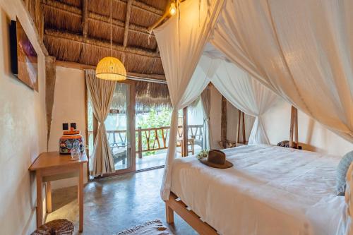 Katil atau katil-katil dalam bilik di Casa Ganesh Tulum-Beachfront hotel by Ahau Collection