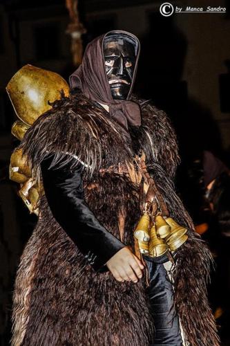 a person dressed in a costume with a mask at Bed and Breakfast Su Niu in Quartucciu