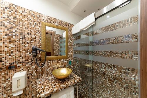 Koupelna v ubytování Hotel Vogue