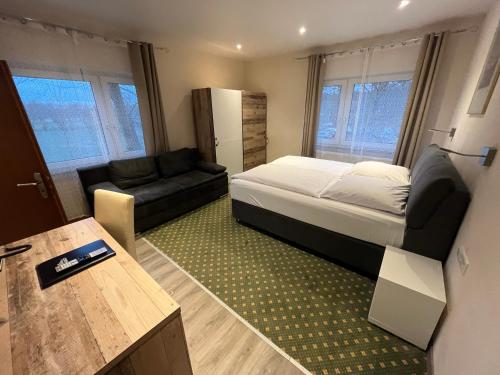 Postel nebo postele na pokoji v ubytování Hotel Aquarius Braunschweig