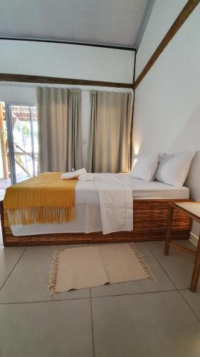Katil atau katil-katil dalam bilik di Rosagash Paradise - Praia de Santo Antonio