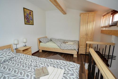 Una cama o camas en una habitación de Apartmani ,,Vasa ,, 4