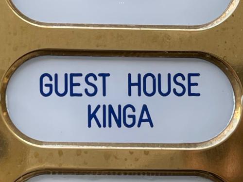 a sign that reads guest house kinga on a door at GUEST HOUSE KINGA CAVOUR in Florence