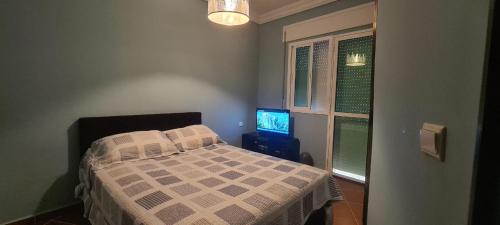 Ένα ή περισσότερα κρεβάτια σε δωμάτιο στο Appartement Cosy Bien équipée